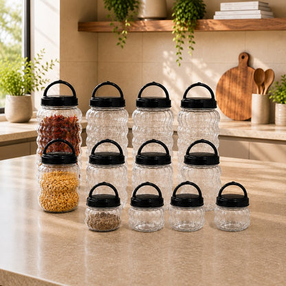 Plastic kitchen storage jars with black lids for storing pulses, spices and dry food