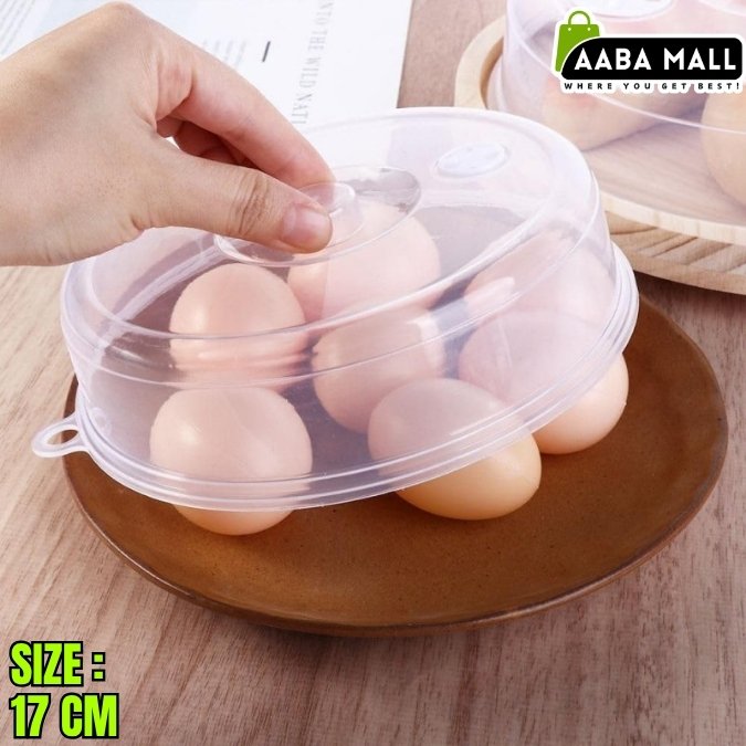 Eggs in a transparent plastic cover on a wooden surface with 'AABA MALL' branding.