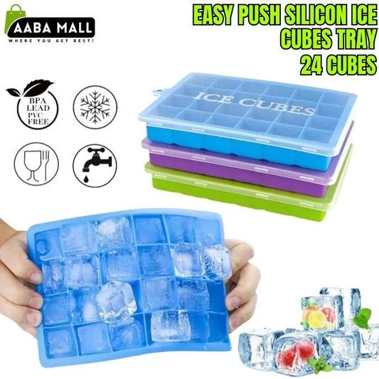 Blue silicone ice cube tray with ice cubes, surrounded by other colored trays and ice cubes.