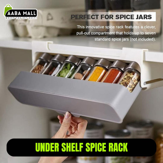White plastic under shelf spice rack organizer, shown adhered beneath a kitchen cabinet shelf, neatly holding several rows of small spice jars with clear labels.