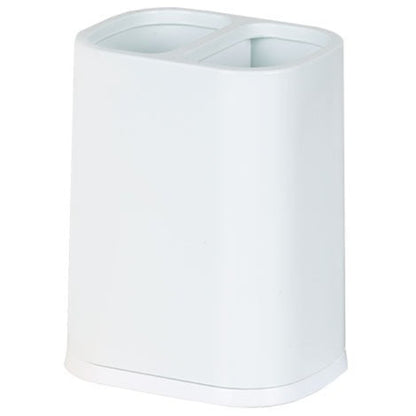 Multi-purpose plastic cutlery storage basket standing on a kitchen counter, holding spoons, forks, and knives in separate compartments, showing drainage holes.