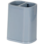 Multi-purpose plastic cutlery storage basket standing on a kitchen counter, holding spoons, forks, and knives in separate compartments, showing drainage holes.