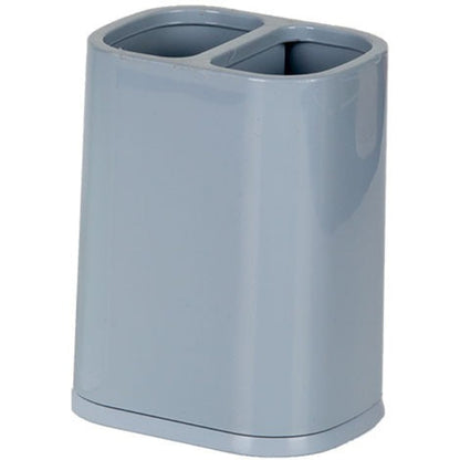 Multi-purpose plastic cutlery storage basket standing on a kitchen counter, holding spoons, forks, and knives in separate compartments, showing drainage holes.