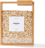Close-up of a bamboo wooden rice and grain storage box with a fitted lid, shown filled with white rice, sitting on a kitchen pantry shelf.