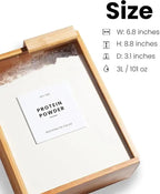Close-up of a bamboo wooden rice and grain storage box with a fitted lid, shown filled with white rice, sitting on a kitchen pantry shelf.