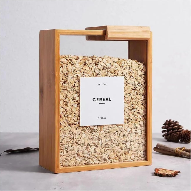 Close-up of a bamboo wooden rice and grain storage box with a fitted lid, shown filled with white rice, sitting on a kitchen pantry shelf.