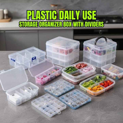 plastic storage organizer boxes with various compartments on a kitchen counter.