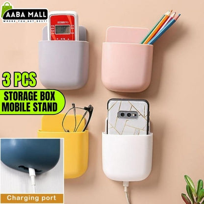 Set of three wall-mounted storage boxes with charging ports, each holding different items.