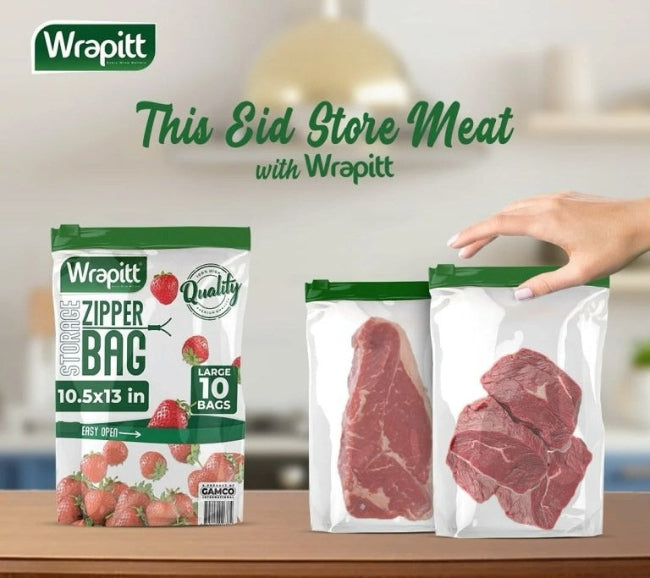 Clear, heavy-duty reusable zip lock storage bags, one filled with raw meat and another with fresh vegetables, displayed in a freezer compartment.