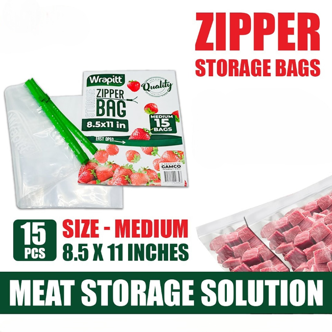 Clear, heavy-duty reusable zip lock storage bags, one filled with raw meat and another with fresh vegetables, displayed in a freezer compartment.